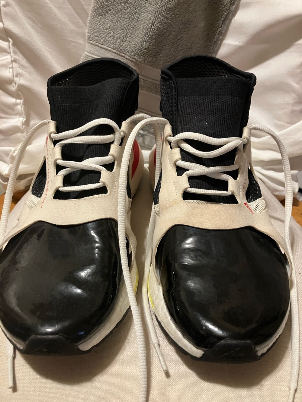 Used , but like new. Stella McCartney designer sneakers sz 7 semi high tops